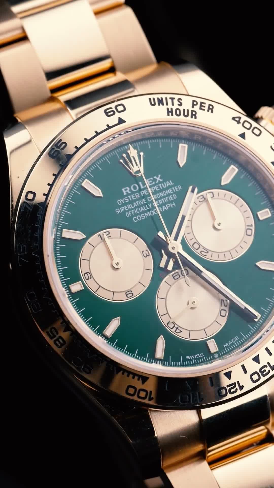WatchTrader and Co shopfront and a gold watch being handled in gloves